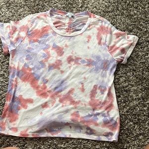 It fits like a medium, but it is a large. I’ve never worn it.